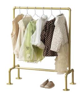 lot 25575 image: Kids Pipes Dress up Racks, Kids Clothing Racks, Child Garment Racks, Hanging Clothes Rod Storage Shelf Organizers Shelves Shelving, Gold Metal - Retail $40