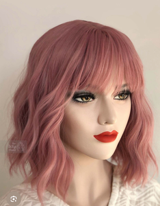 lot 42159 image: Pastel Pink Bob Wig with Bangs