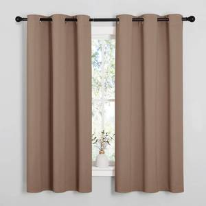 lot 26145 image: NICETOWN Window Treatment Thermal Insulated Solid Grommet Blackout CurtainsDrapes for Bedroom (Set of 2 Panels, 42 by 63 Inch, Cappuccino) - Retail $23