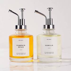 lot 26172 image: Molimoli (Upgraded Pump) Coffee Syrup Dispenser for Coffee Bar, Coffee Pump Dispenser, Glass Syrup Bottle w. Pump, 11.8 oz 350 ml, Set of 2, Silver - Retail $30
