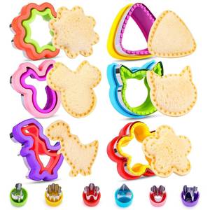 lot 40272 image: 12 Pack Sandwich Cutter and Sealer Set Crustable Bread Decruster DIY Cookie Stamps Mold Vegetable Fruit Cutters Shapes for Kids Back to School Bento Box Accessories - Retail $15