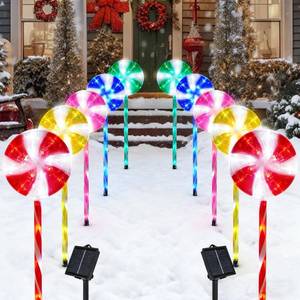 lot 49106 image: BRIGHTDECK Lollipop Solar Christmas Pathway Lights Outdoor, 10 Pack LED Christmas Decor with 8 Lighting Modes, Light Up Solar Stake Lights for Holiday, Xmas, Walkway, Sidewalk (Multicolour, 10 PCS) - Retail $74