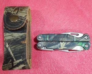 lot 3769 image: Leatherman Charge Multi-Tool with Camo Case