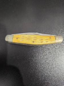 lot 3855 image: Yellow Bone Handle Folding Knife