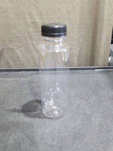 lot 3923 image: Lot of Food-grade Beverage Bottles Black Lids for Water Juice Storage and Dispensing Pet Plastic Drink Containers