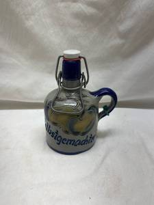lot 140 image: German Stoneware Flip-Top Bottle with Blue Accents