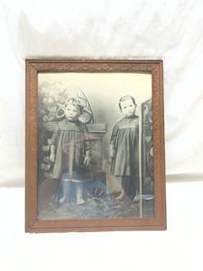 lot 184 image: Early 1900s Carved Wood Picture Frame with Black and White Photograph