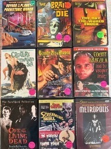 lot 321 image: DVDs - Classic Horror, Fun Titles Including Voyage to the Planet of Prehistoric Women - See Pictures for Variety