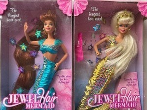lot 114 image: Midge (sealed) and Barbie (opened) Mermaid Dolls