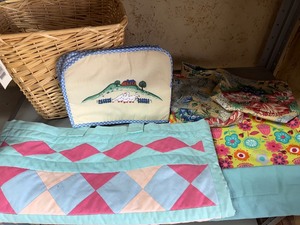 lot 128 image: Trash Basket (new) Filled w Homemade Bags and a Toaster Cover