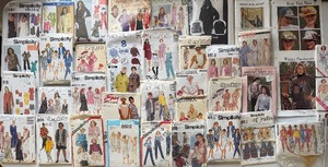 lot 127 image: Table Full of Patterns, Hats, Clothes and MORE See Pictures for Variety