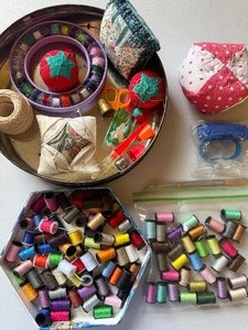 lot 152 image: Tin with Thread, Pin Cushions, Thimbles and MORE Please See Pictures for Variety