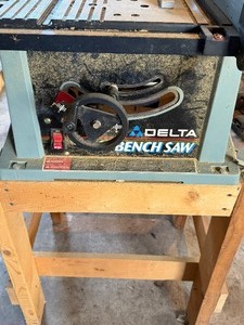 lot 57 image: Delta Bench Saw (attached to stand), Model 36-540