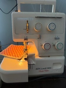 lot 440 image: Janome EZY Lock 304