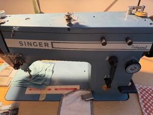 lot 444 image: Singer Sewing Machine Attached to Table, Industrial Clutch Motor and Accessories
