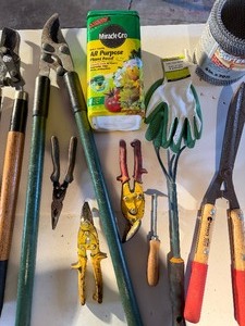 lot 753 image: Yard Tools, Miracle Grow, Gutter Guard, Gloves