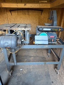 lot 806 image: Table Saw, Ryobi Sander, Craftsman Band Saw and All Accessories We Found With It In Shed (see pictures)