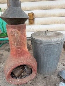 lot 810 image: Small Chiminea and Galvanized Can w Wood Pieces