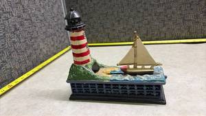 Mechanical Bank Cast Iron - Lighthouse and Sailboat
