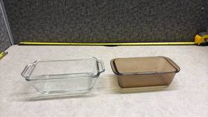 lot 1006 image: Anchor Hocking Clear Glass Loaf Pan and a Pyrex Brown Loaf Pan