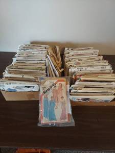 lot 2040 image: Large Lot of McCalls and Simplicity Sewing Patterns