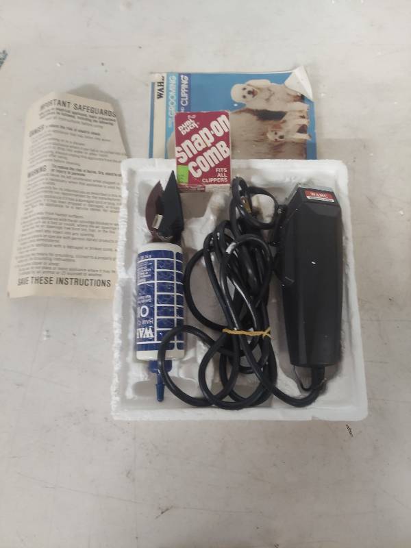 lot 3634 image: Wahl Electric Hair Clipper with Snap-On Comb