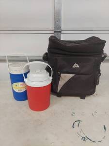lot 2292 image: Coleman Half Gallon Water Jugs and Polar Rolling Cooler Set