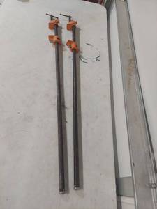lot 1217 image: Long Bar Clamps with Orange Handle - Set of 2