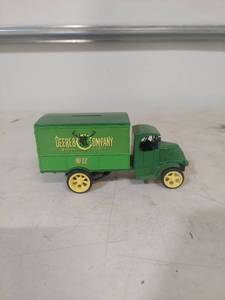 lot 1137 image: John Deere Company Delivery Truck Coin Bank