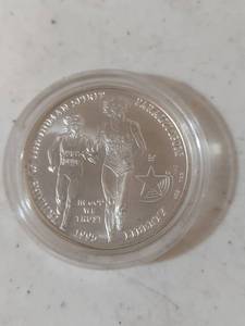 lot 1173 image: 1995 Paralympic Silver Dollar - 90% Silver