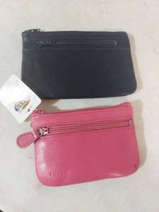 lot 1218 image: Fossil Pink Leather Coin Purse and Rolfs Coin Purse