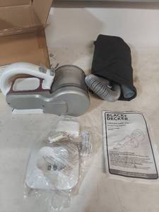 lot 1304 image: BlackDecker PHV1811 Cordless Hand Vacuum with Accessories