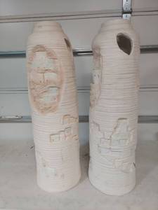 lot 1312 image: (2) Zuni Pueblo Limited Edition Pottery Vases with Pueblo Scene Relief Carving