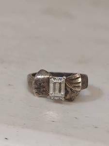 lot 3433 image: Sterling Silver Emerald Cut Clear Stone Ring with Hammered Band