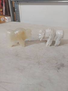 lot 2019 image: Carved Stone Buffalo Figurines
