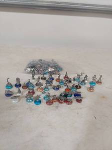 lot 2033 image: Figurine Collection on Colored Glass Bases
