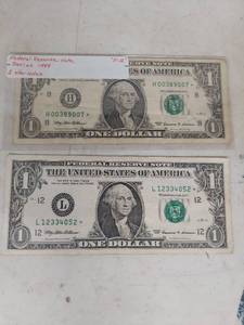 lot 2086 image: (2) 1999 Federal Reserve Note One Dollar Star Notes