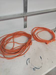 lot 2100 image: Orange Outdoor Extension Cord Set