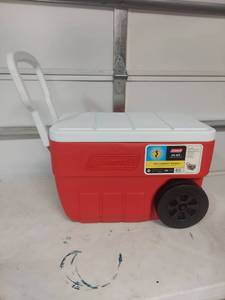 lot 2121 image: New Coleman 34 Quart Wheeled Cooler with Handle