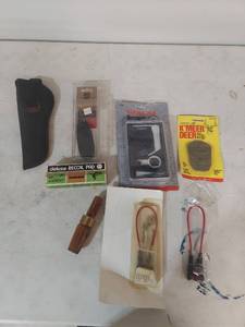 lot 2174 image: Hunting Accessories Bundle - Scope Guide, Deer Call, Recoil Pad, Duck Call, Trigger Lock