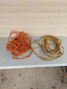 lot 1016 image: Outdoor Extension Cord Lot - Orange and Yellow Heavy Duty Cords