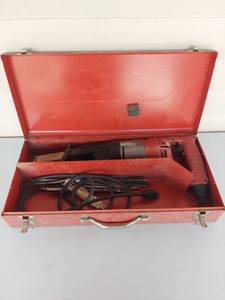 lot 1073 image: Milwaukee Reciprocating Saw with Metal Case and Blades