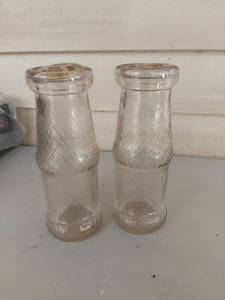 lot 1076 image: Wichita Natural Milk Glass Bottles with Paper Caps - Set of 2