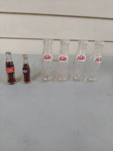 lot 1083 image: 2 Miniature Coca-Cola and Pepsi-Cola Glass Bottle shakers