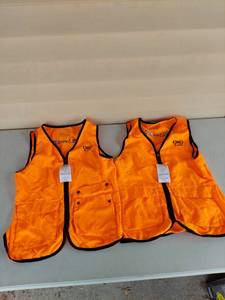 lot 1121 image: Girls With Guns Blaze Orange Big Game Hunting Vests (Set of 2)