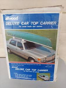 lot 1145 image: Attwood Deluxe Car Top Carrier for Small Boats and Canoes