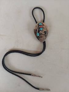 lot 1173 image: Native American Chief Buffalo Nickel Bolo Tie with Turquoise and Coral Stones