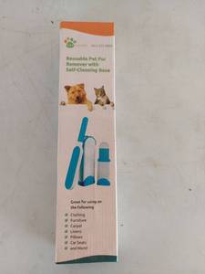 lot 1258 image: Pet Trends Reusable Pet Fur Remover with Self-Cleaning Base