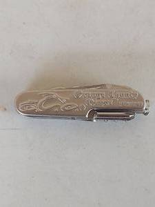 lot 2273 image: Orange County Choppers New York Multi-Tool Pocket Knife