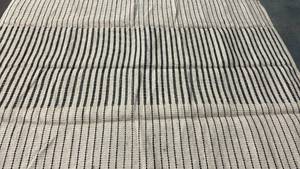 lot 2017 image: Threshold Reseda Hand Woven Area Rug. Size 7x10. Color BrownBlack.